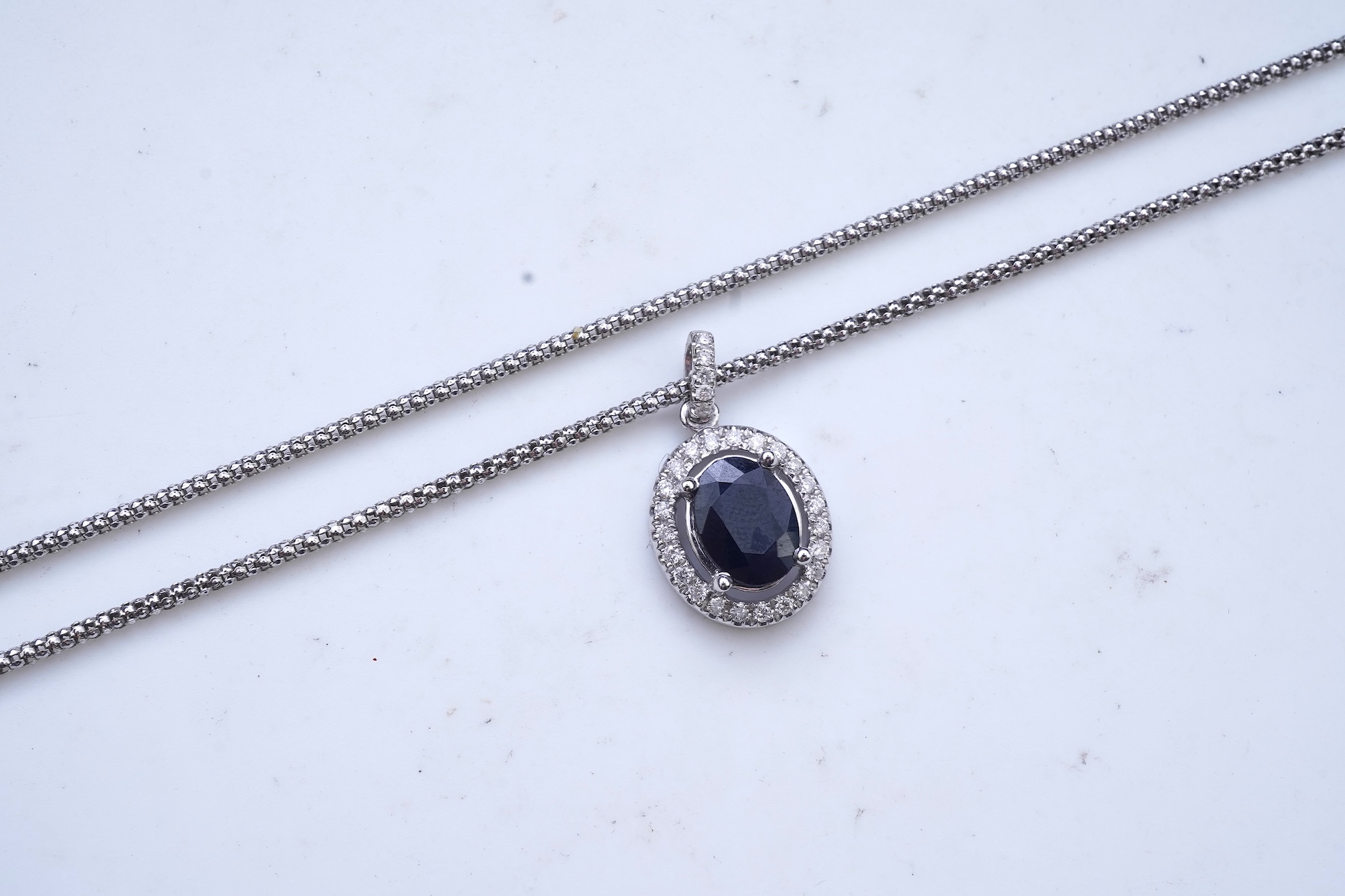A sapphire and diamond demi-parure